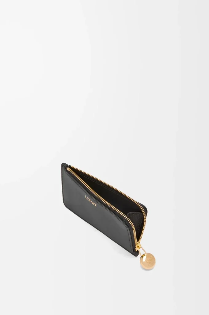 Portamonete Pebble in pelle di vitello nappa lucida Black