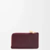 Portamonete Pebble in pelle di vitello nappa lucida Burgundy