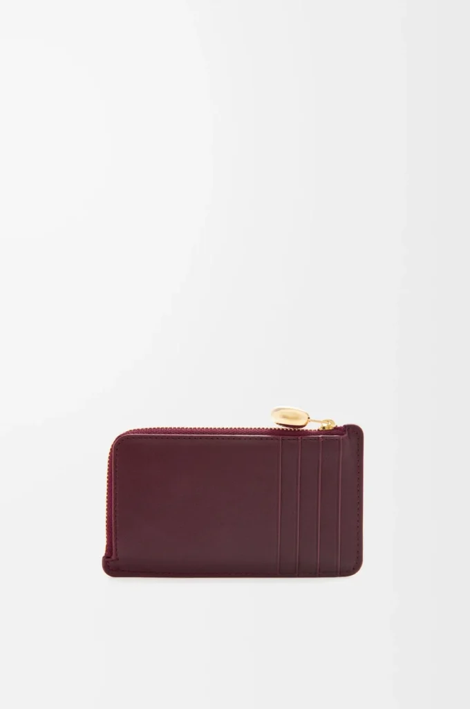 Portamonete Pebble in pelle di vitello nappa lucida Burgundy
