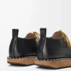 Scarpe stringate con rivetti in pelle di vitello conciata al vegetale Nero Scarpe stringate con rivetti in pelle di vitello conciata al vegetale Nero