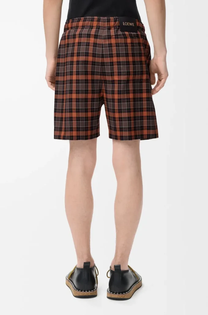 Shorts in misto lana arancione/nero