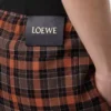 Shorts in misto lana arancione/nero