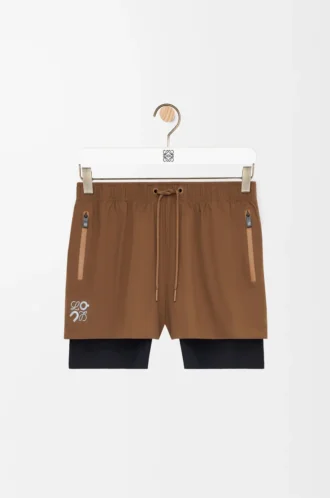 Shorts performanti in tessuto tecnico color caramello