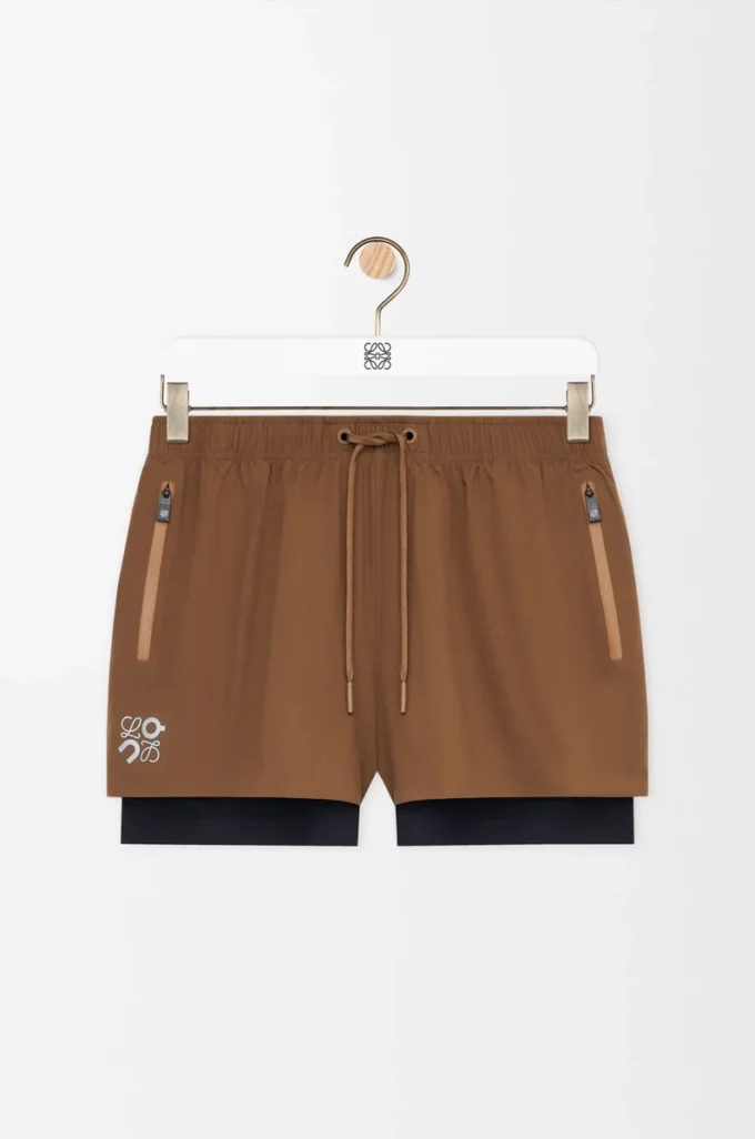 Shorts performanti in tessuto tecnico color caramello