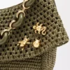 Spilla a forma di cavalletta in ottone dorato Spilla a forma di cavalletta in ottone dorato