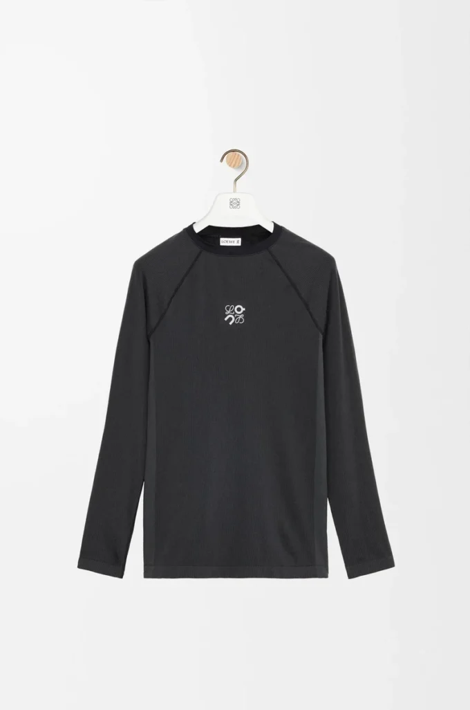 Top a maniche lunghe in jersey tecnico Nero