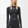 Top a maniche lunghe in jersey tecnico Nero