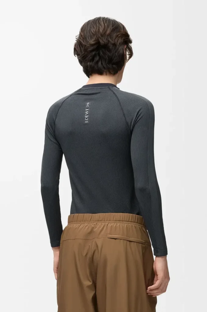 Top a maniche lunghe in jersey tecnico Nero