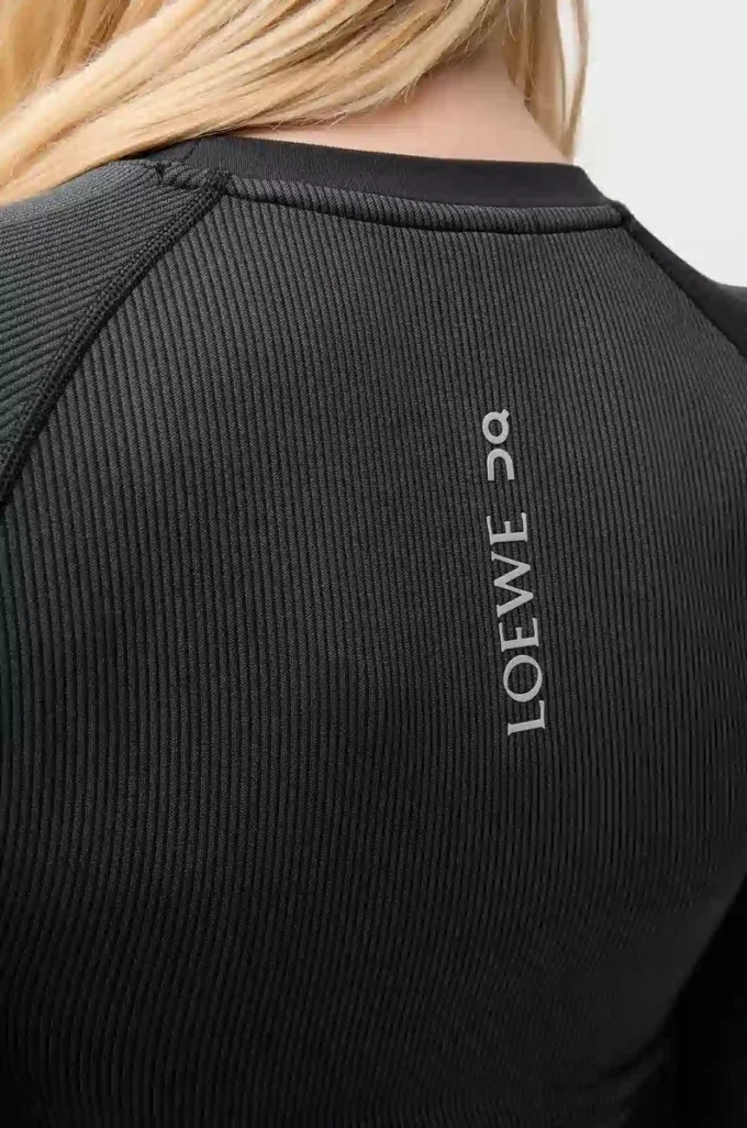 Top a maniche lunghe in jersey tecnico Nero
